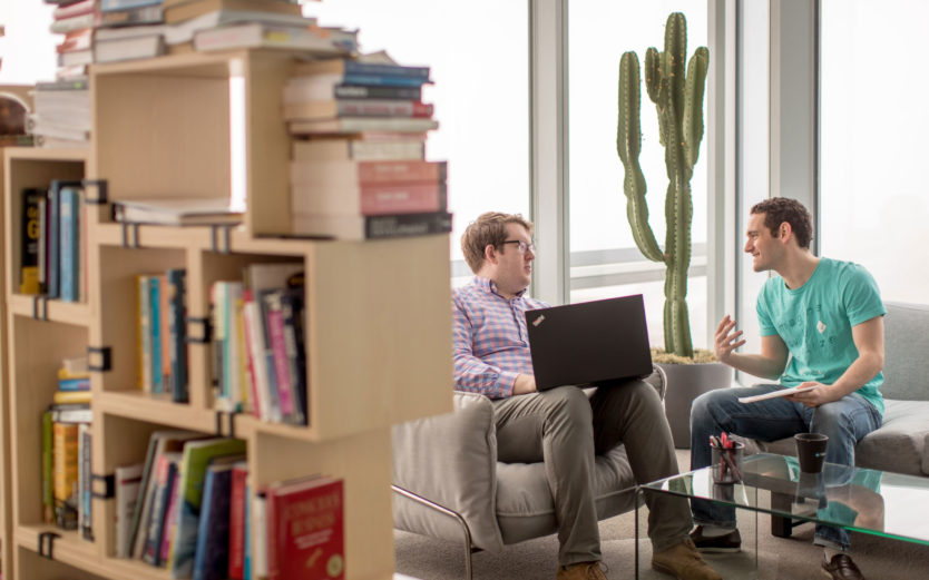 library with couches at the Two Sigma Houston Office